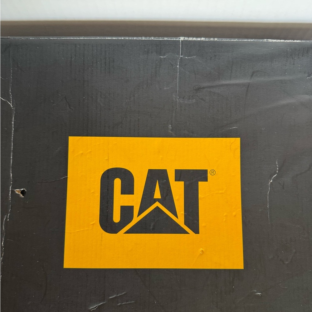 Black 

Steel toe men’s work boots by caterpillar